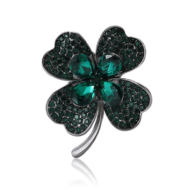 Crystal Four Leaf Clover Brooch shown against a white display background