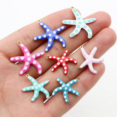 Dotted Enamel Starfish Charms in Two Sizes and Assorted Colors assortment on a plain background