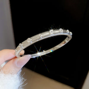 Crystal Pave Hinged Bangle Bracelets in Gold and Silver Tone