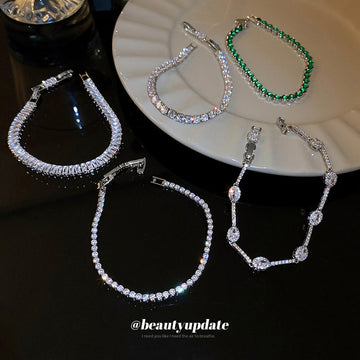 Silver Tone Tennis Bracelet In Three Clear Stone Cuts