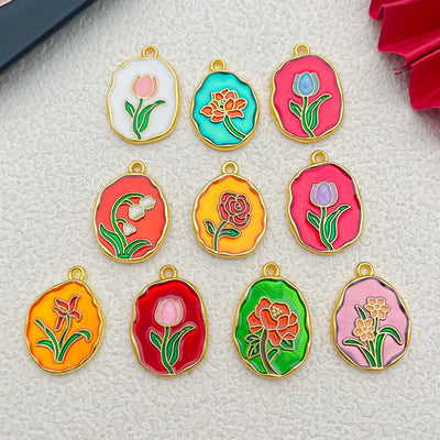 Colorful assorted shape charms arranged on a light background