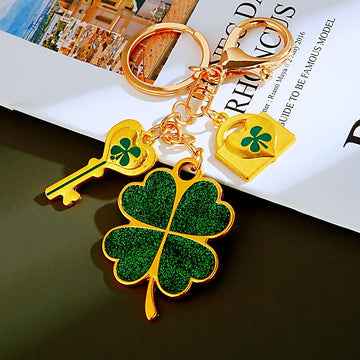 Glitter and Cat Eye Four Leaf Clover Keychains in Two Distinct Styles