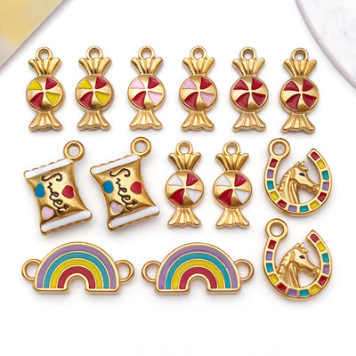 Colorful bow and butterfly charms arranged on a light background