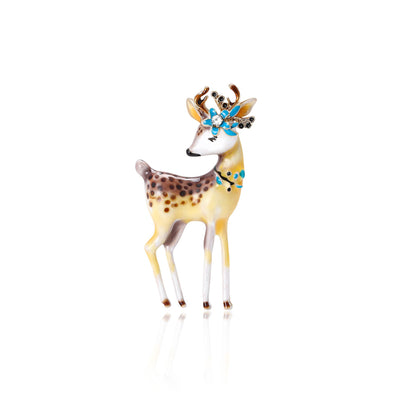Front view of spotted deer enamel brooch with blue crystal antlers