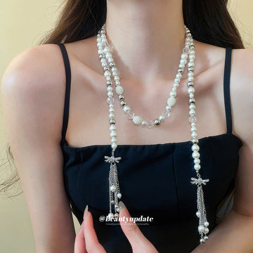 Long Pearl Strand And Crystal Bow Silver Tassel Necklace