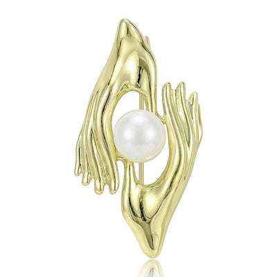 sculpted hands holding pearl brooch group view