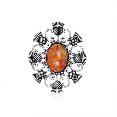 Front product view of the flower brooch pin in silver and orange