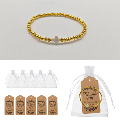 Gold bead white cross bracelet with organza bags and kraft tags