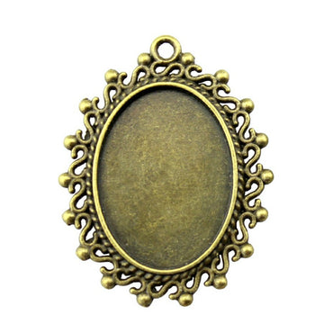 Scrolled Frame Oval Cabochon Pendant Trays in Two Finishes
