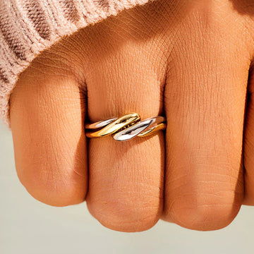 Intertwined Wave Band Ring In Polished Gold And Silver Tones