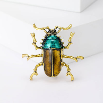 Main product view of 金色绿珐琅甲虫胸针 on a light background