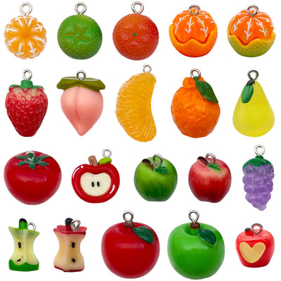 Multicolor lemon and strawberry charms arranged on a light background