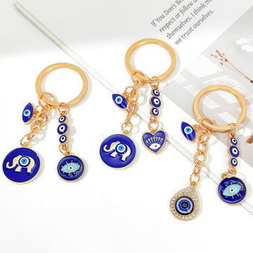Navy Enamel Evil Eye Elephant Charm Keychain With Heart Accent