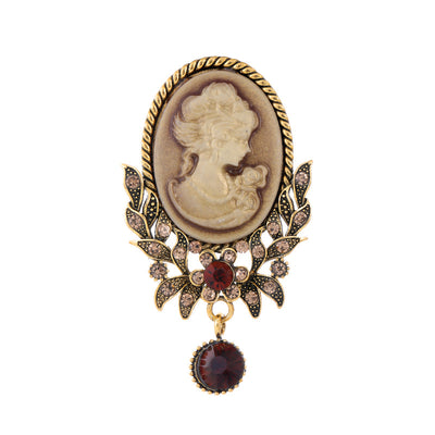Front product view of the woman portrait brooch pin in gold and red