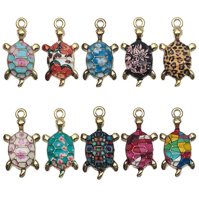 Colorful turtle charms arranged on a light background