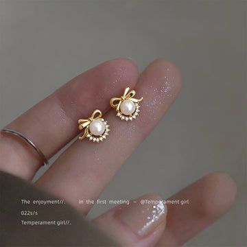 Gold Tone Bow White Pearl And Sunburst Stud Earrings