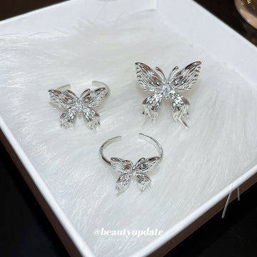 Silver Tone Sculpted Butterfly Open Ring With Clear Crystal Center
