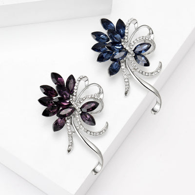 Front view of curved flower spray with colored petal stones and a silver tone stem