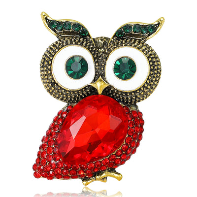 Front view of the jeweled metal owl brooch with red or blue faceted body brooch and its color options