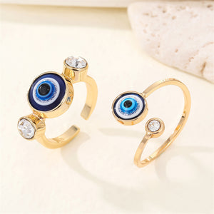 Gold-Tone Adjustable Open Ring with a Blue Evil Eye and Crystals