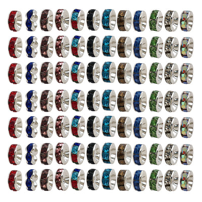 Colorful spacer bead beads arranged on a light background