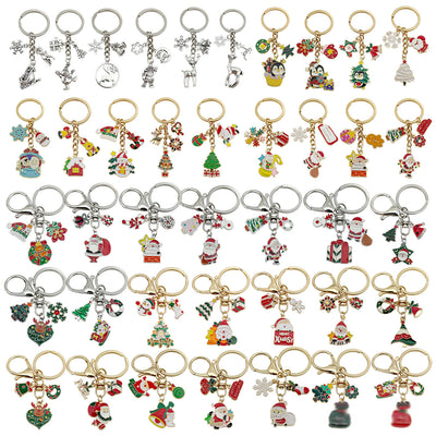 Overview showing the available color and design variations of the Christmas character metal keychain