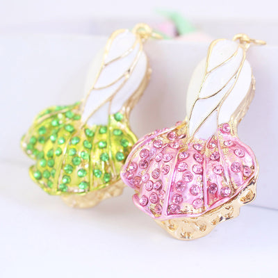 Pink and green rhinestone Chinese cabbage charms displayed together.
