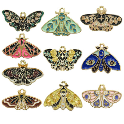Yellow insect charms arranged on a light background