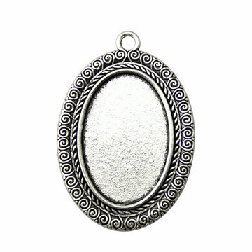 Scrollwork Oval Cabochon Pendant Settings in Two Finishes