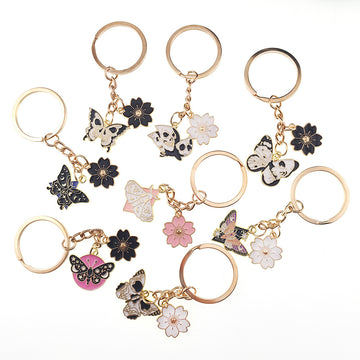 Gold Tone Butterfly Skull and Sakura Flower Clip Keychains