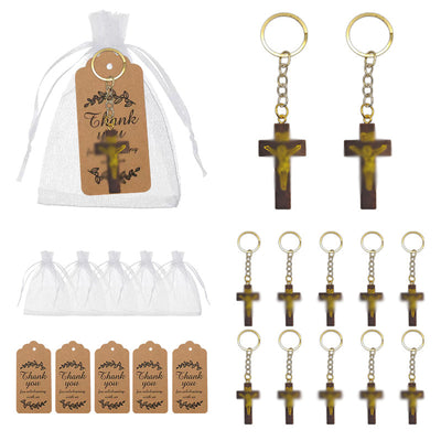 Packaging overview shows the dark wood crucifix keychain with an organza bag and kraft tags.