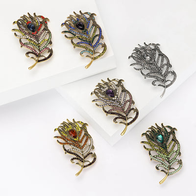 peacock feather crystal brooch group view