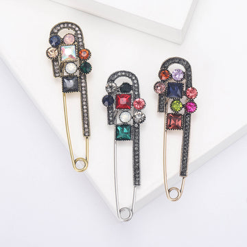 Safety Pin Brooch In Metal With Geometric Multicolor Stones And A Hanging Crystal Bar