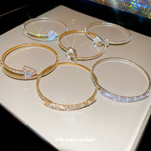Clear Crystal Bow Center Open Cuff In Gold Or Silver Tone