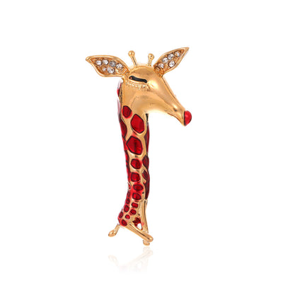 Front product view of the giraffe brooch pin in gold and red