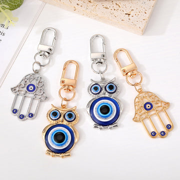 Gold and Silver Tone Owl and Hamsa Evil Eye Clip Keychains