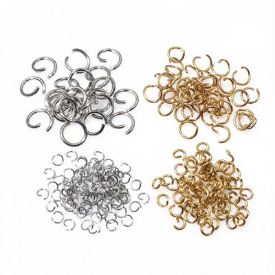 Grouped front view of stainless steel open jump rings in thirty two size and color options