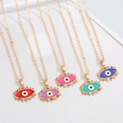 Main product view of gold Tone Spiked Crystal Evil Eye Pendant Necklaces in Five Colors