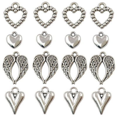 Metallic heart charms arranged on a light background