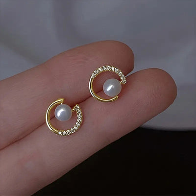 Crescent pearl stud earrings product view