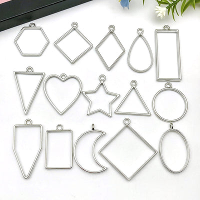 Metallic heart charms arranged on a light background