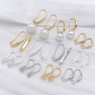 Front overview of cup c shape and smooth u shape earring hooks arranged by finish and size