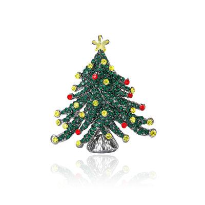 Front view of green crystal christmas tree brooch decorative metal pin