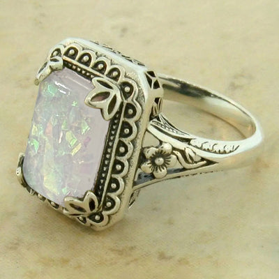 Duplicate angled shot of antique silver faux opal ring