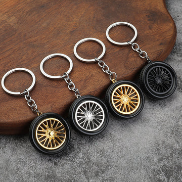 Spoke Wheel Tire Keychain in Four Listed Rim Color Styles