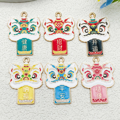 Colorful cake charms arranged on a light background