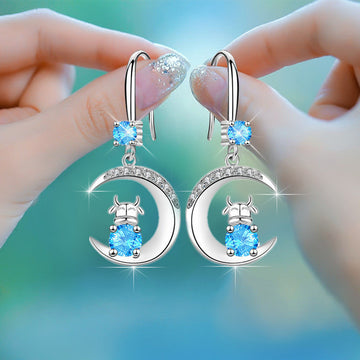 Silver Tone Crescent and Calf Drop Earrings in Three Stone Colors
