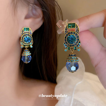 Blue Crystal Oval Statement Clip On Earrings with Polished Metal Accents