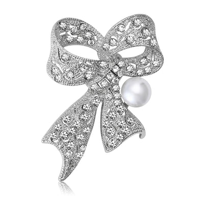 A crystal-set ribbon bow with a pearl-like drop shown on a white background