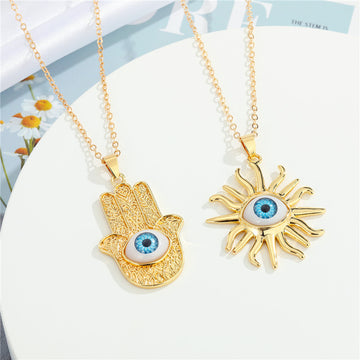 Gold Tone Hamsa Hand and Sun Blue Eye Pendant Necklaces